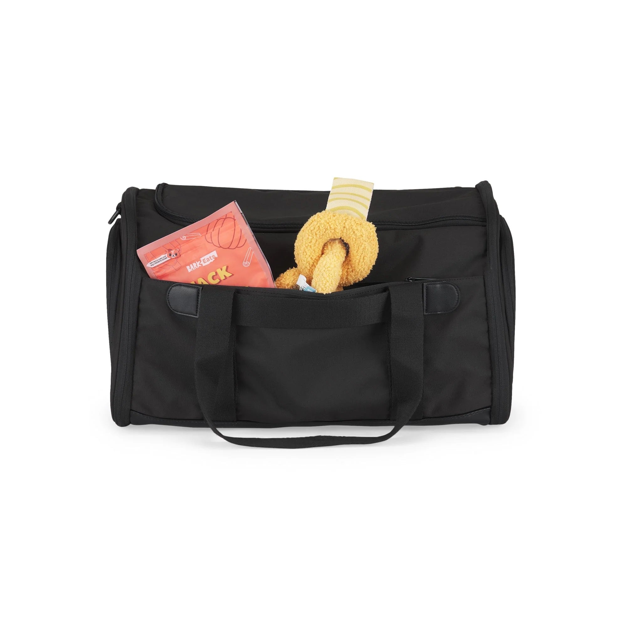 Black duffel bag with a toy and card on a white background