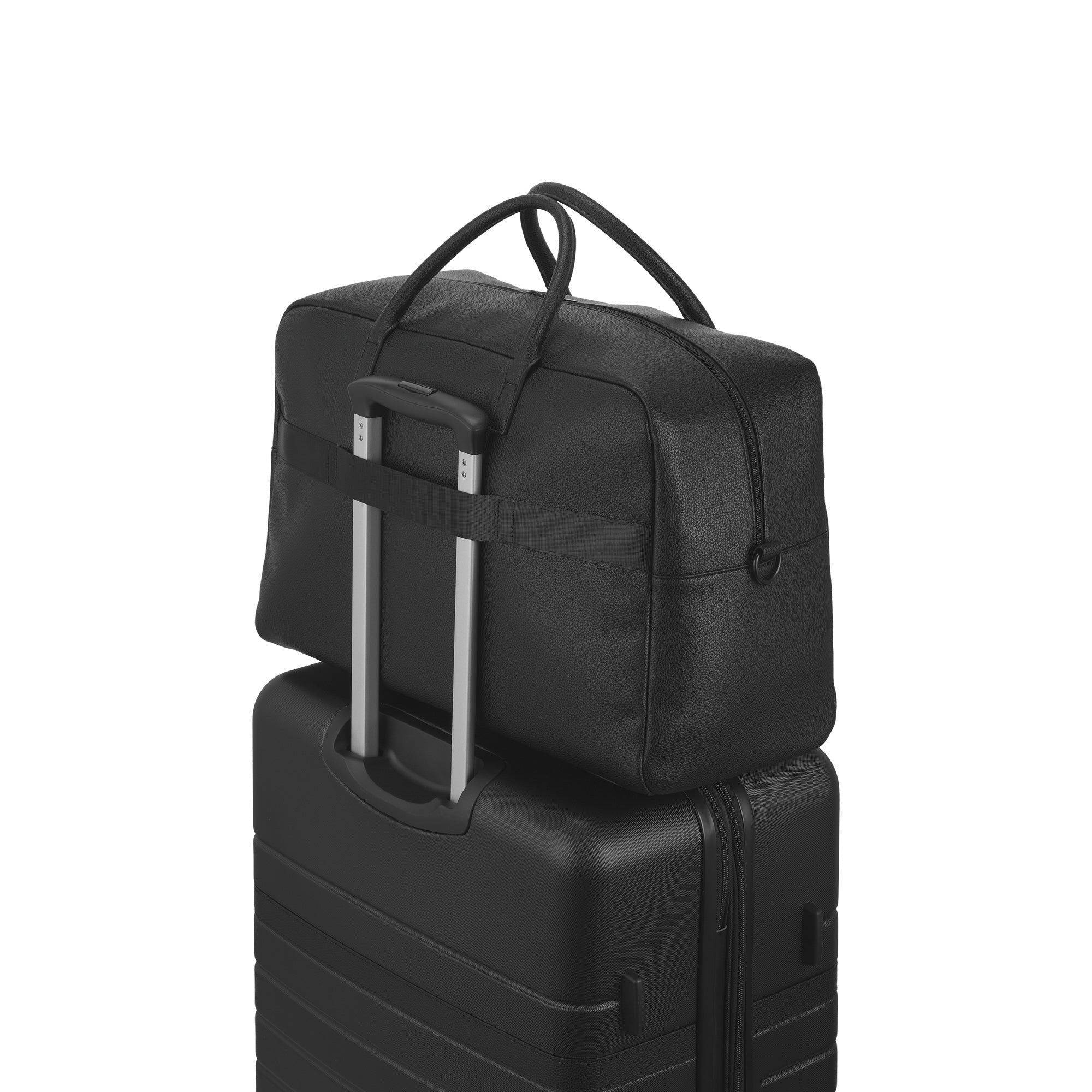 Black suitcase with a matching black duffel bag on a white background