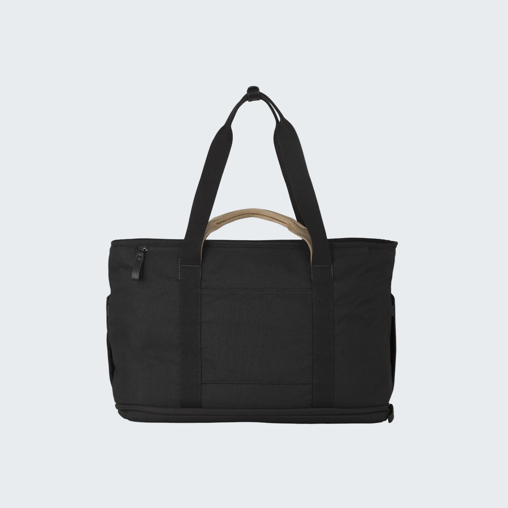 Black tote bag with wooden handle on a white background