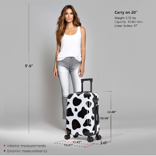 Woman holding a cow print suitcase with measurements displayed