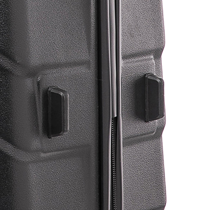Close-up of a gray suitcase with black latches on a white background