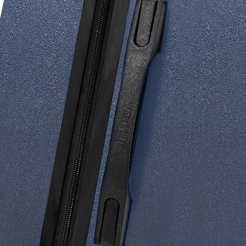 Close-up of a blue suitcase with a black zipper and 'TUMI' branding.