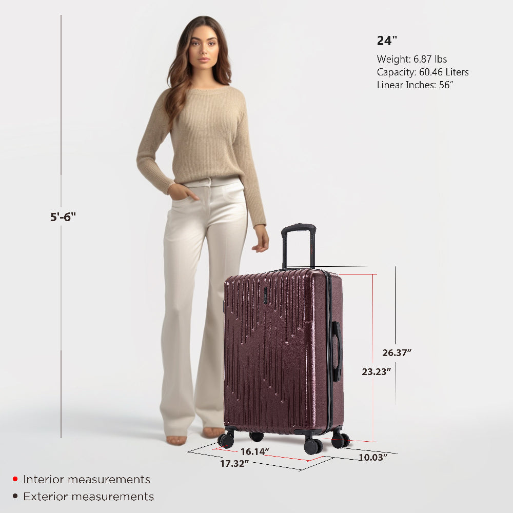 Woman standing next to a 24-inch suitcase with measurements displayed