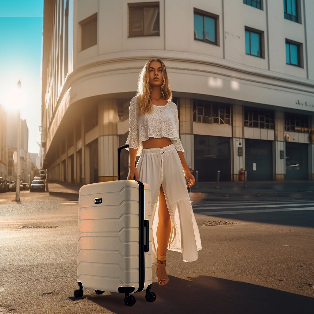 Woman with a white suitcase on a city street