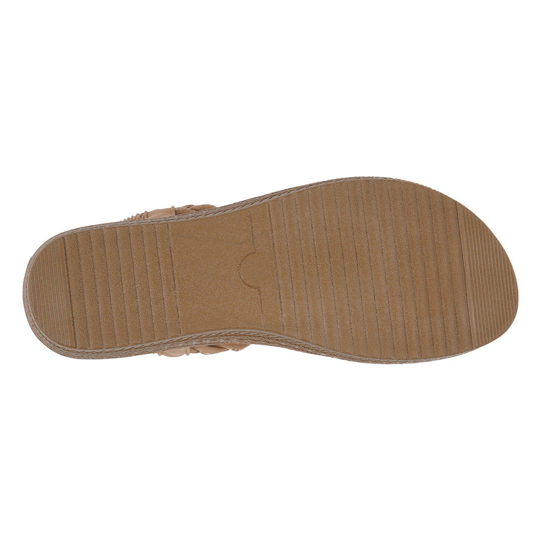 Tan sandal sole on a white background