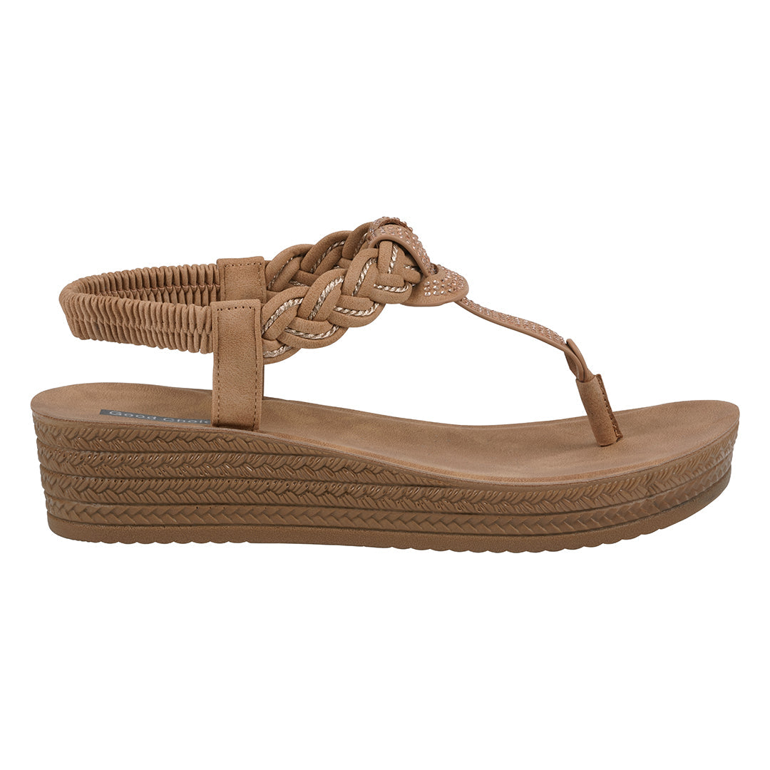 Brown wedge sandal with braided design on a white background