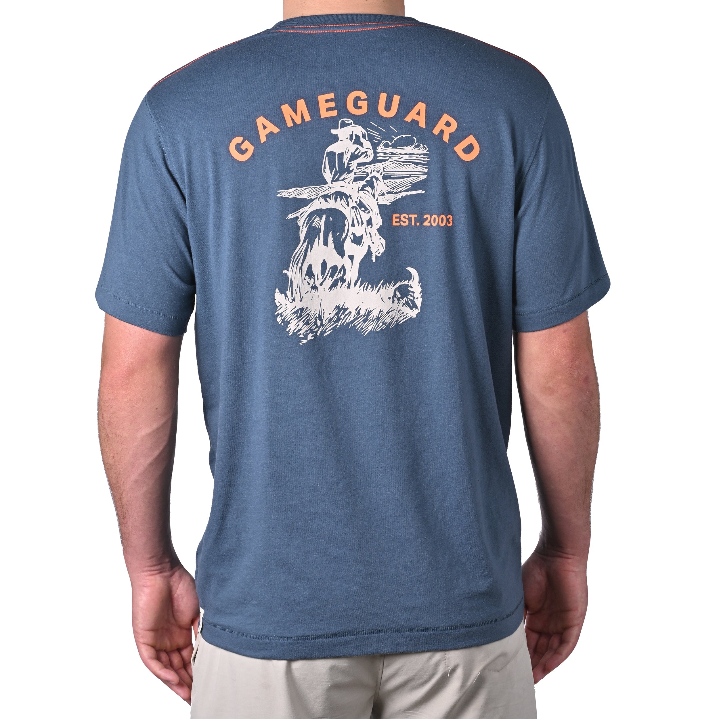 Blue t-shirt with 'Gameguard' logo on the back, worn by a person