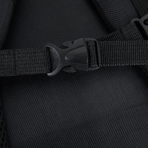 Close-up of a black backpack strap with buckle on a black background