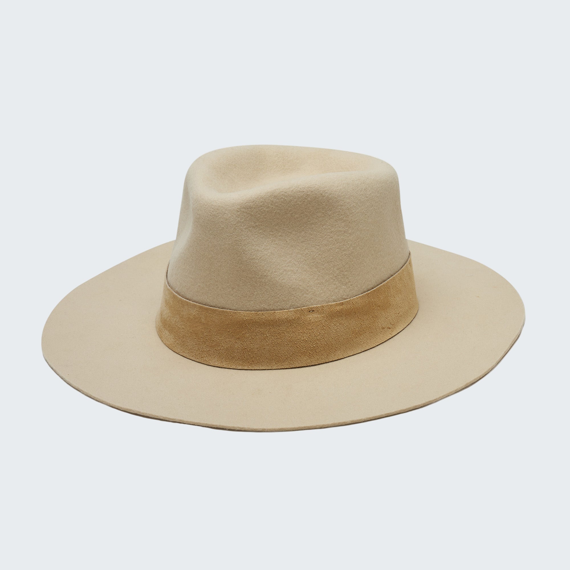 Beige fedora hat with a brown band on a white background