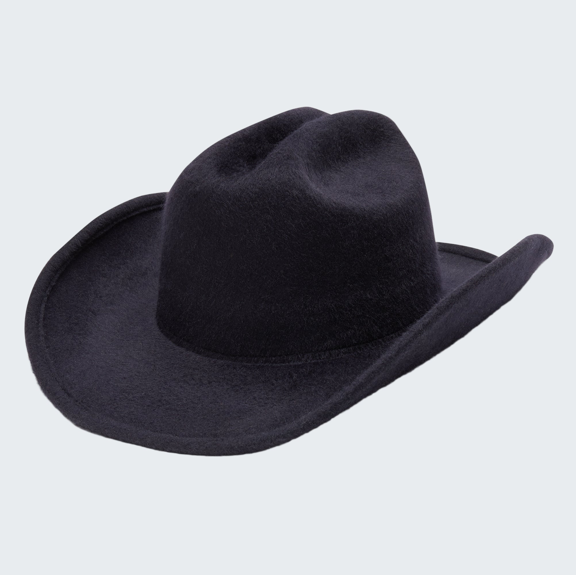 Black cowboy hat on a light gray background