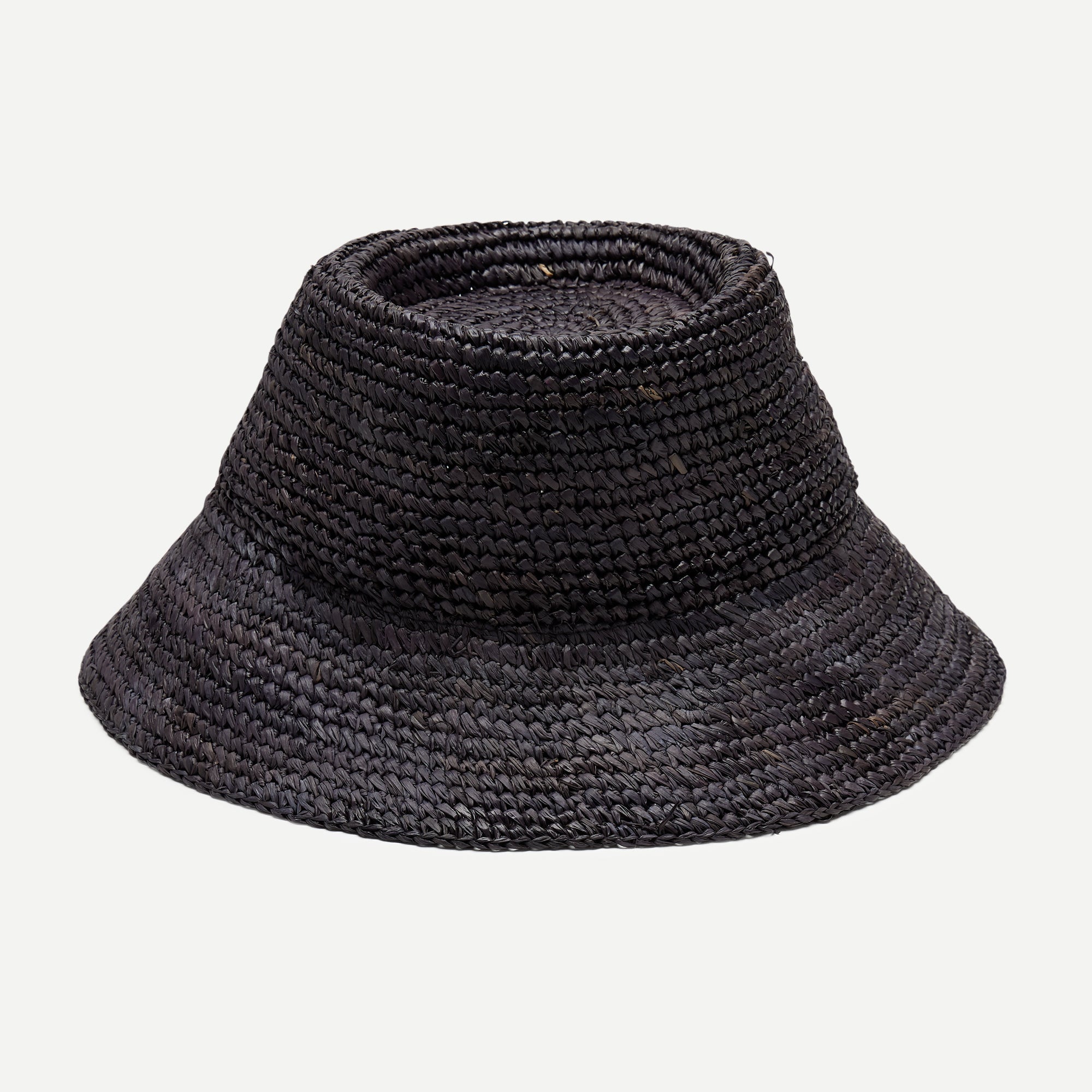 Black woven bucket hat on a light gray background