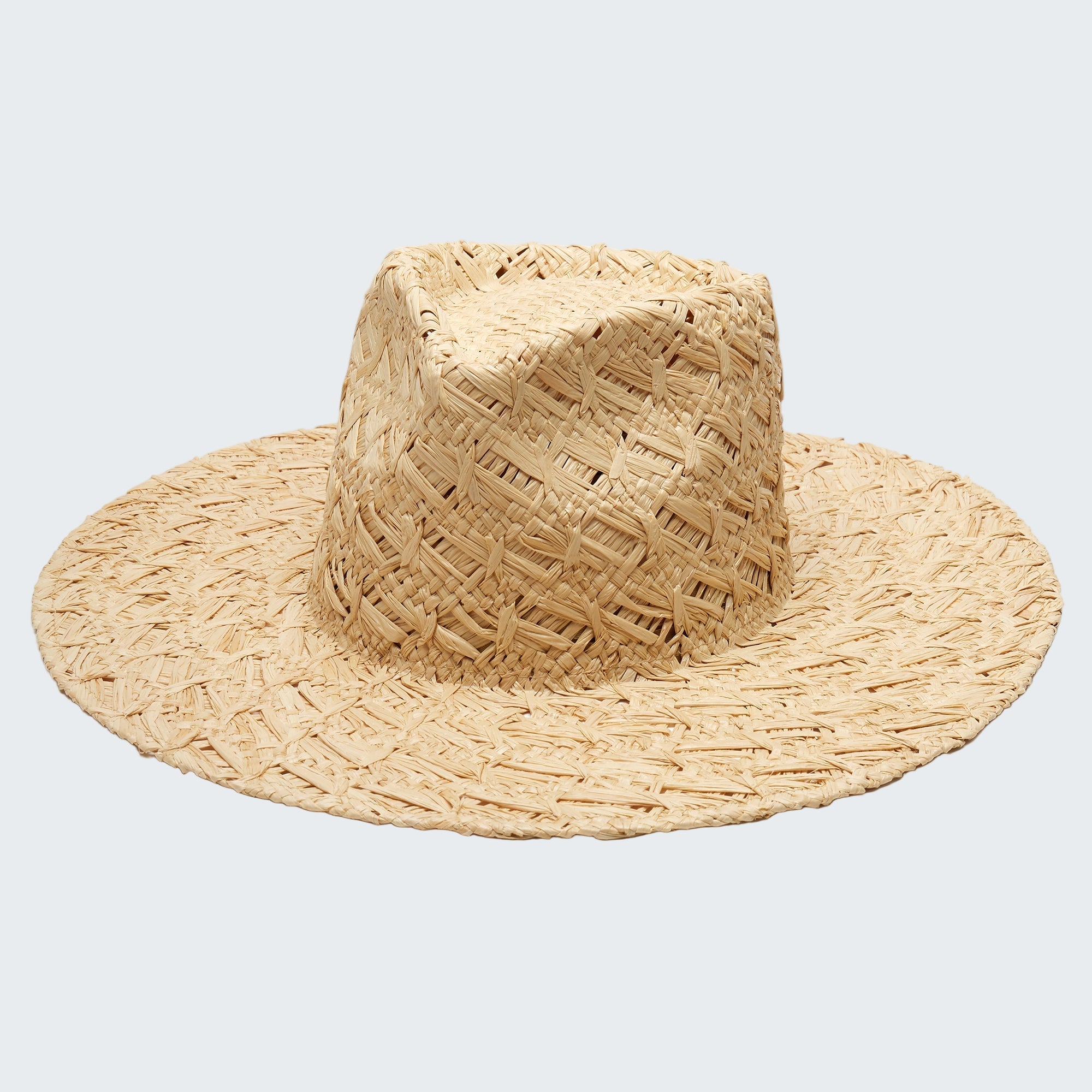 Woven straw hat on a white background