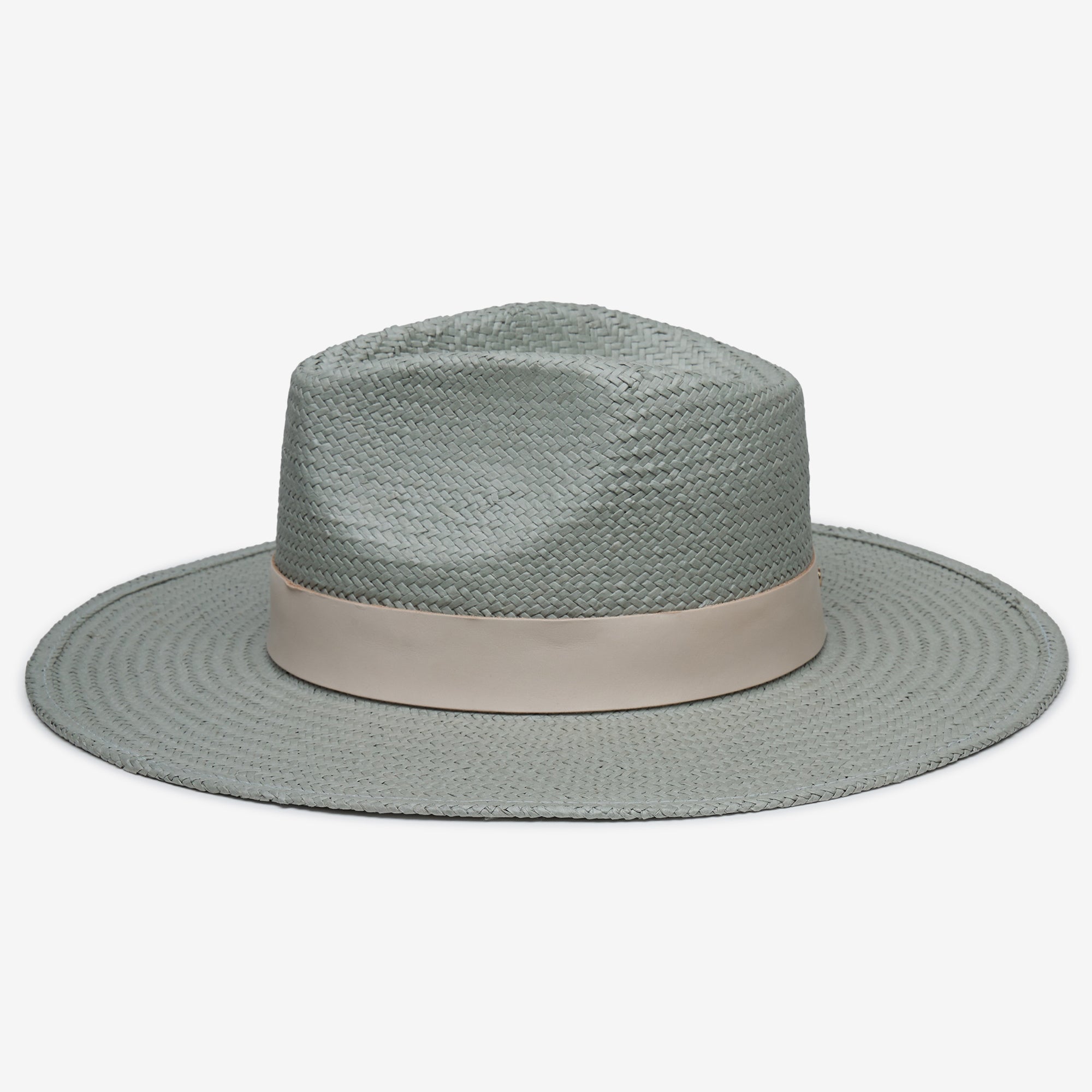 Light blue straw hat with a beige band on a white background