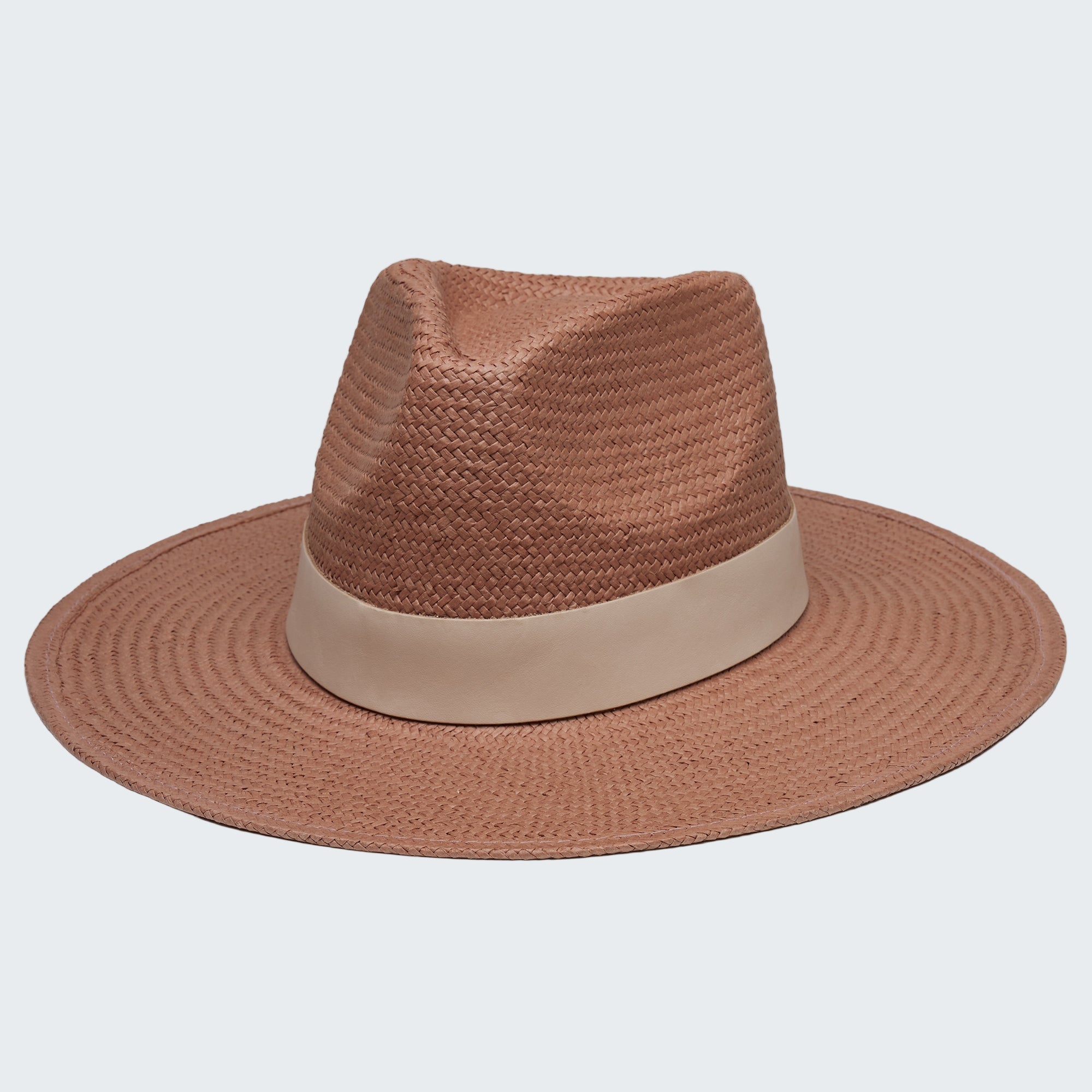 Brown straw hat with a beige band on a white background