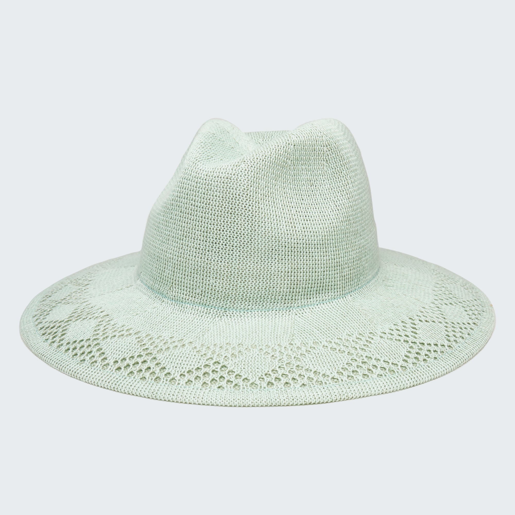 Light green straw hat on a white background