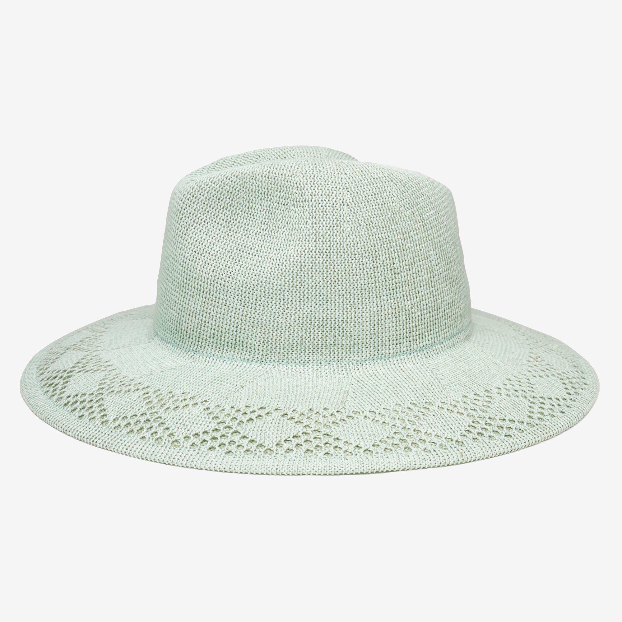 Light green woven hat on a white background