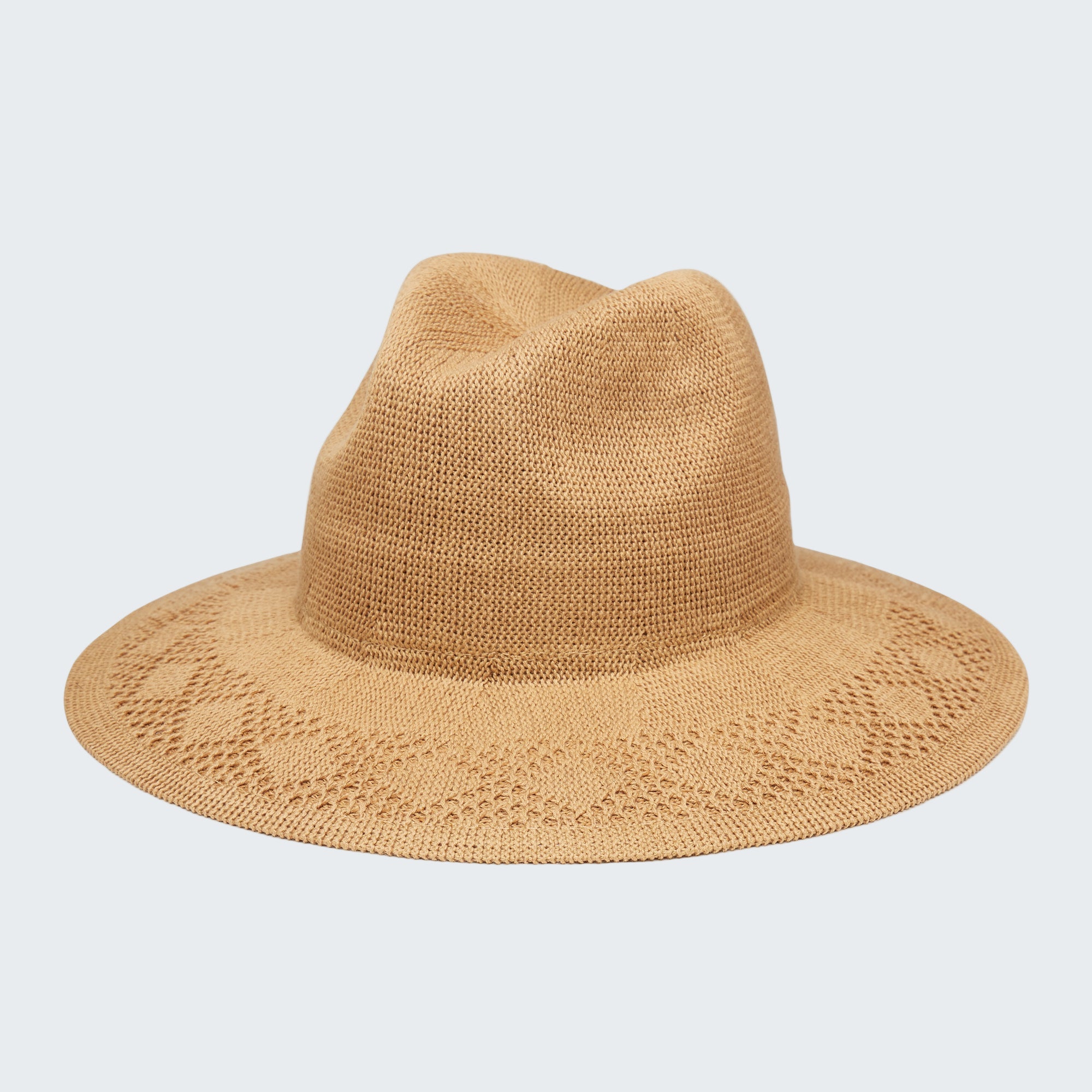 Beige straw hat on a white background
