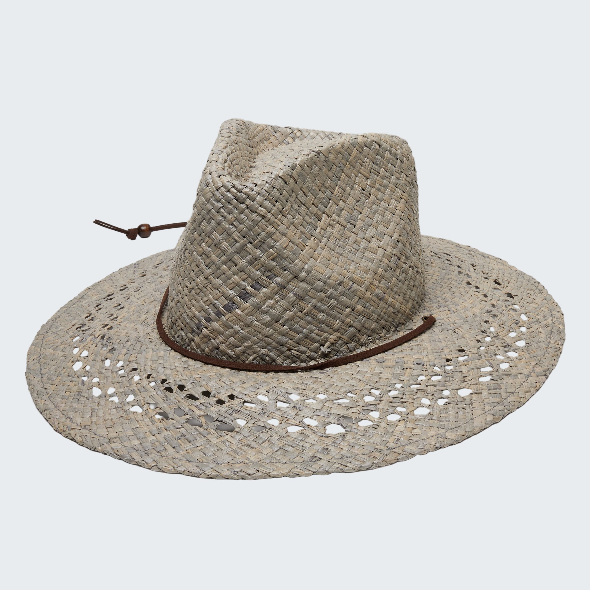 Woven straw hat with a brown band on a white background