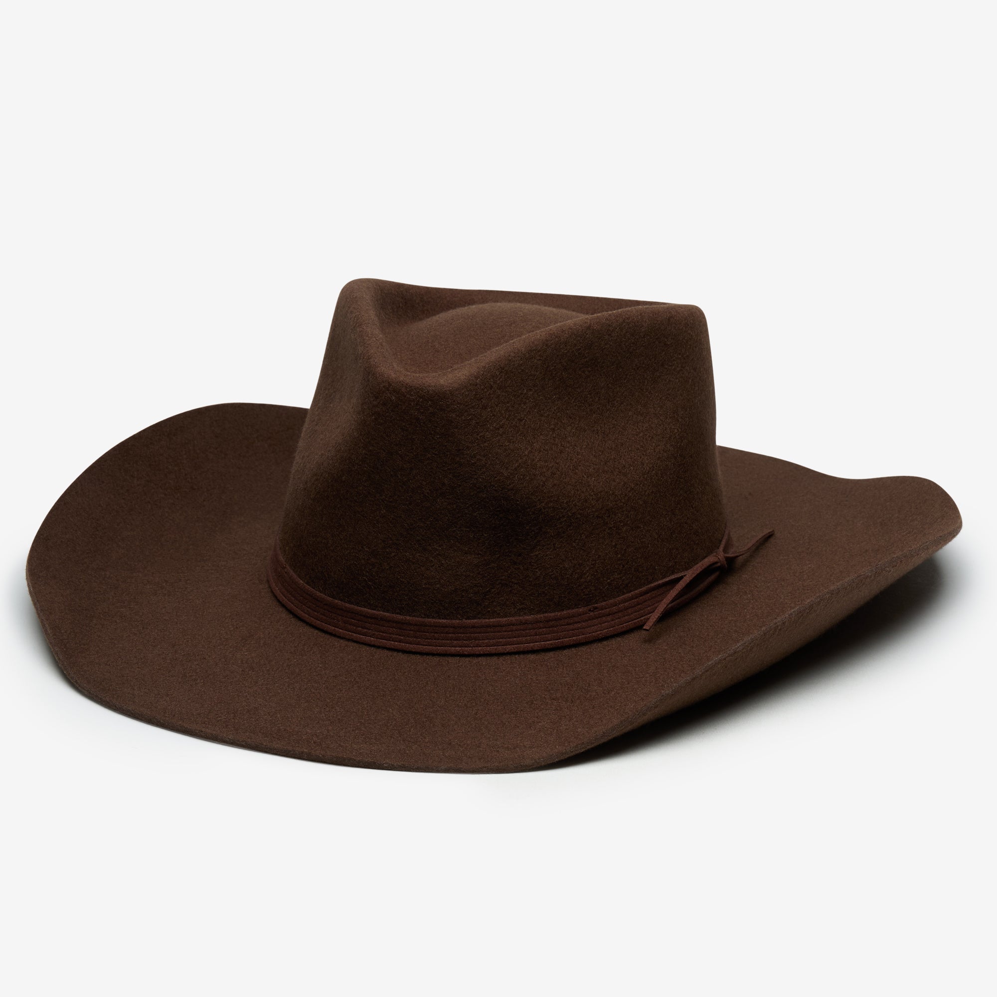 Brown cowboy hat on a white background
