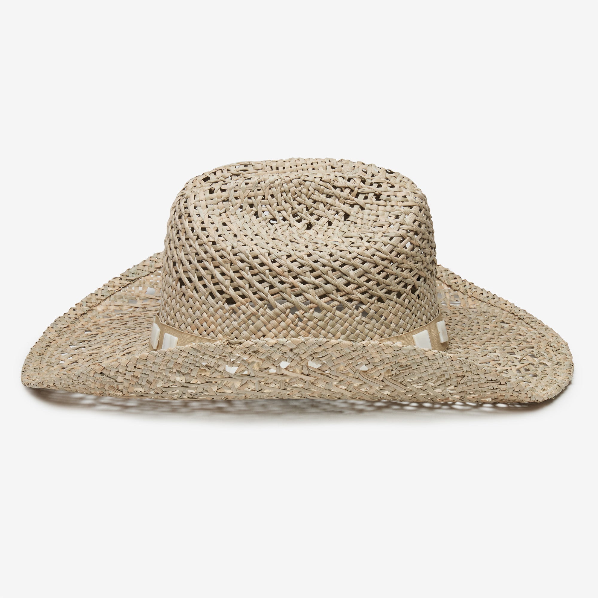 Beige straw hat with wide brim on a white background