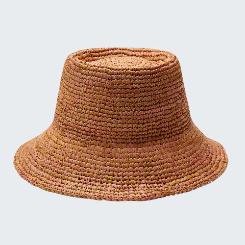 Brown woven bucket hat on a white background