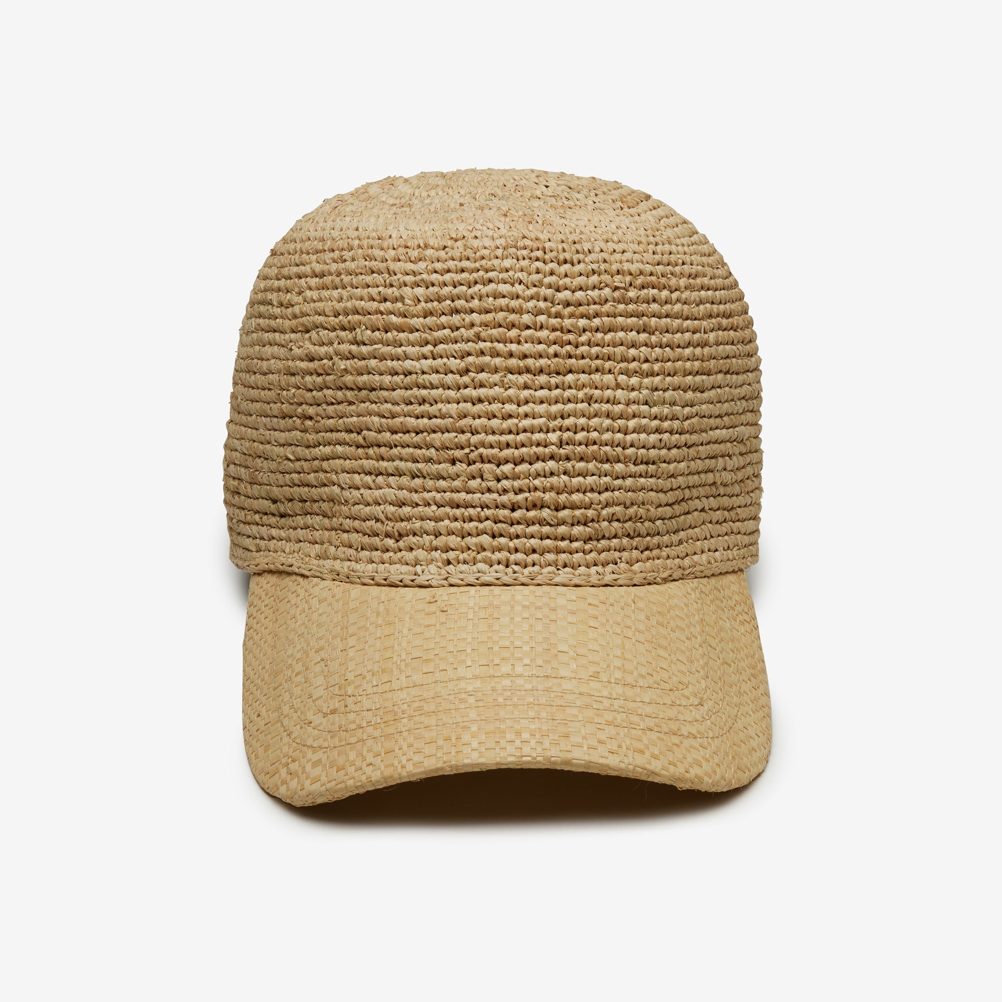 Beige straw cap on a white background