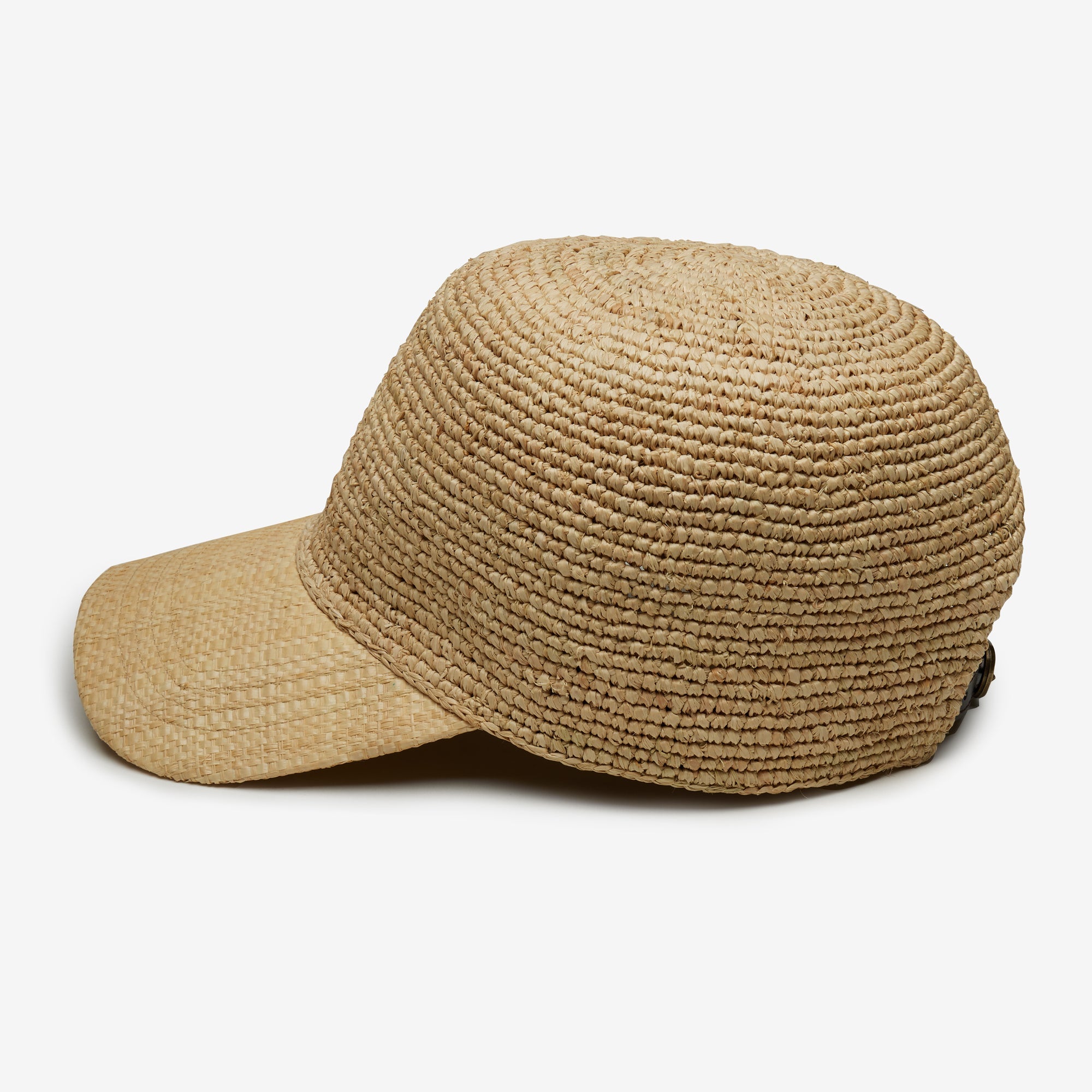 Beige straw cap on a white background