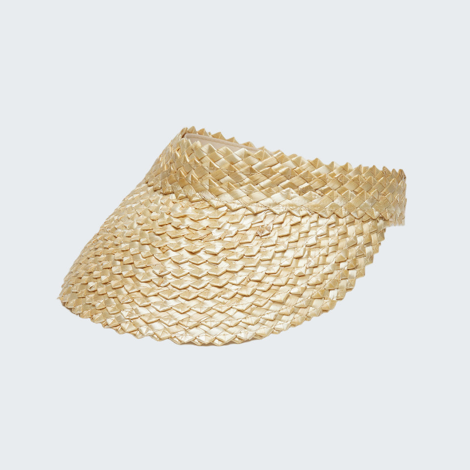 Beige woven visor hat on a light gray background