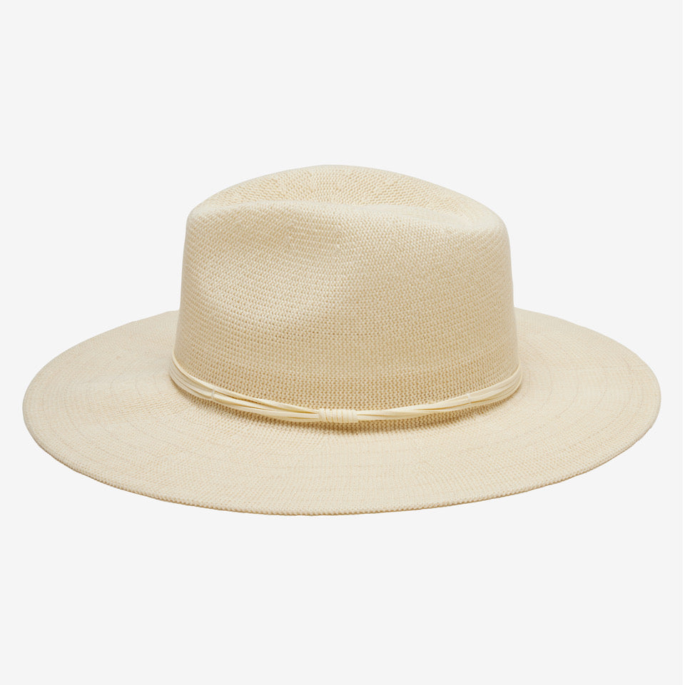 Beige straw hat on a white background