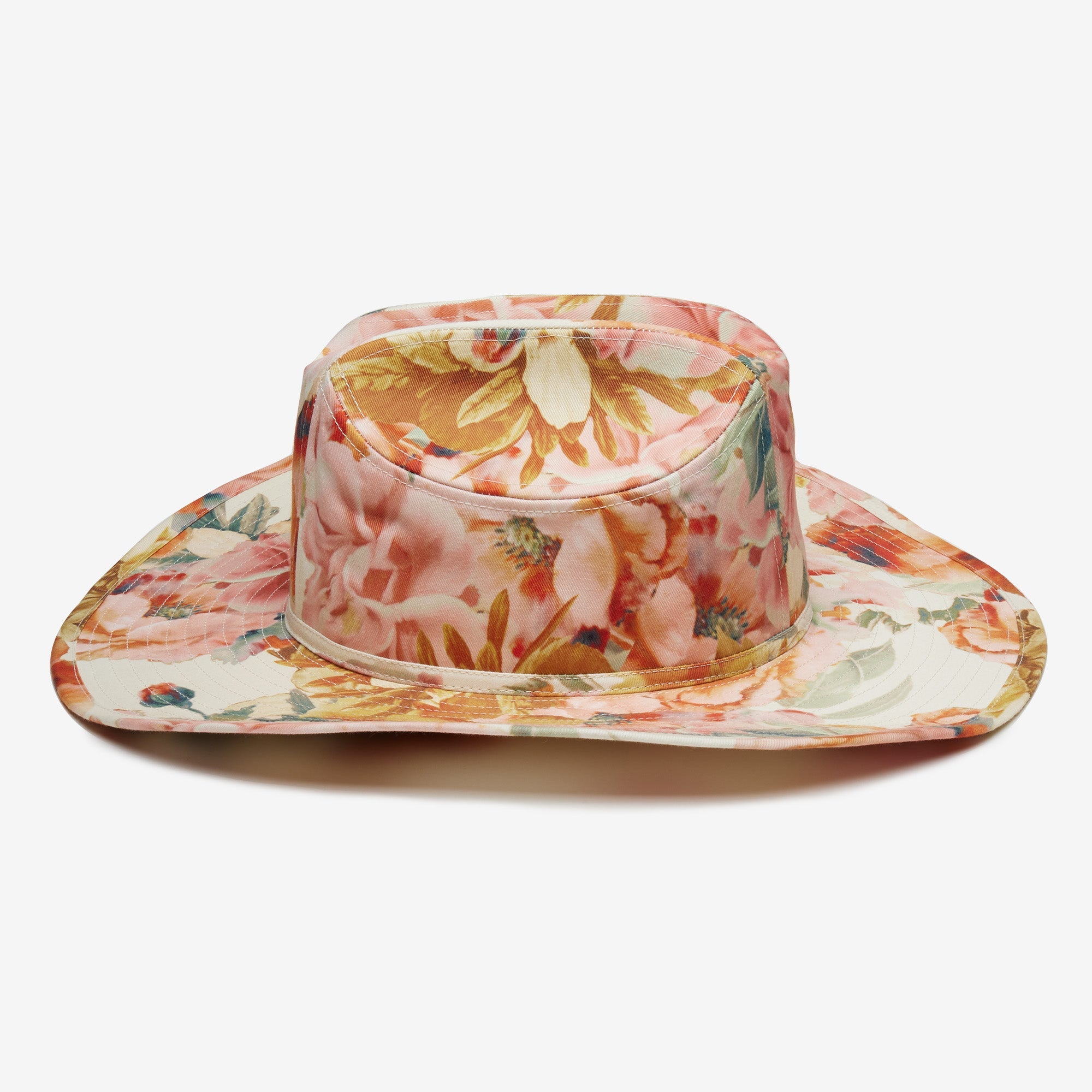 Floral patterned sun hat on a white background