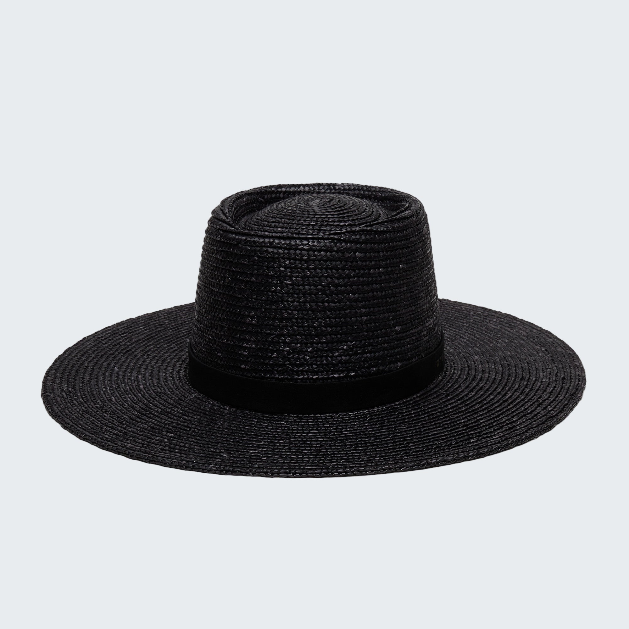Black straw hat on a white background