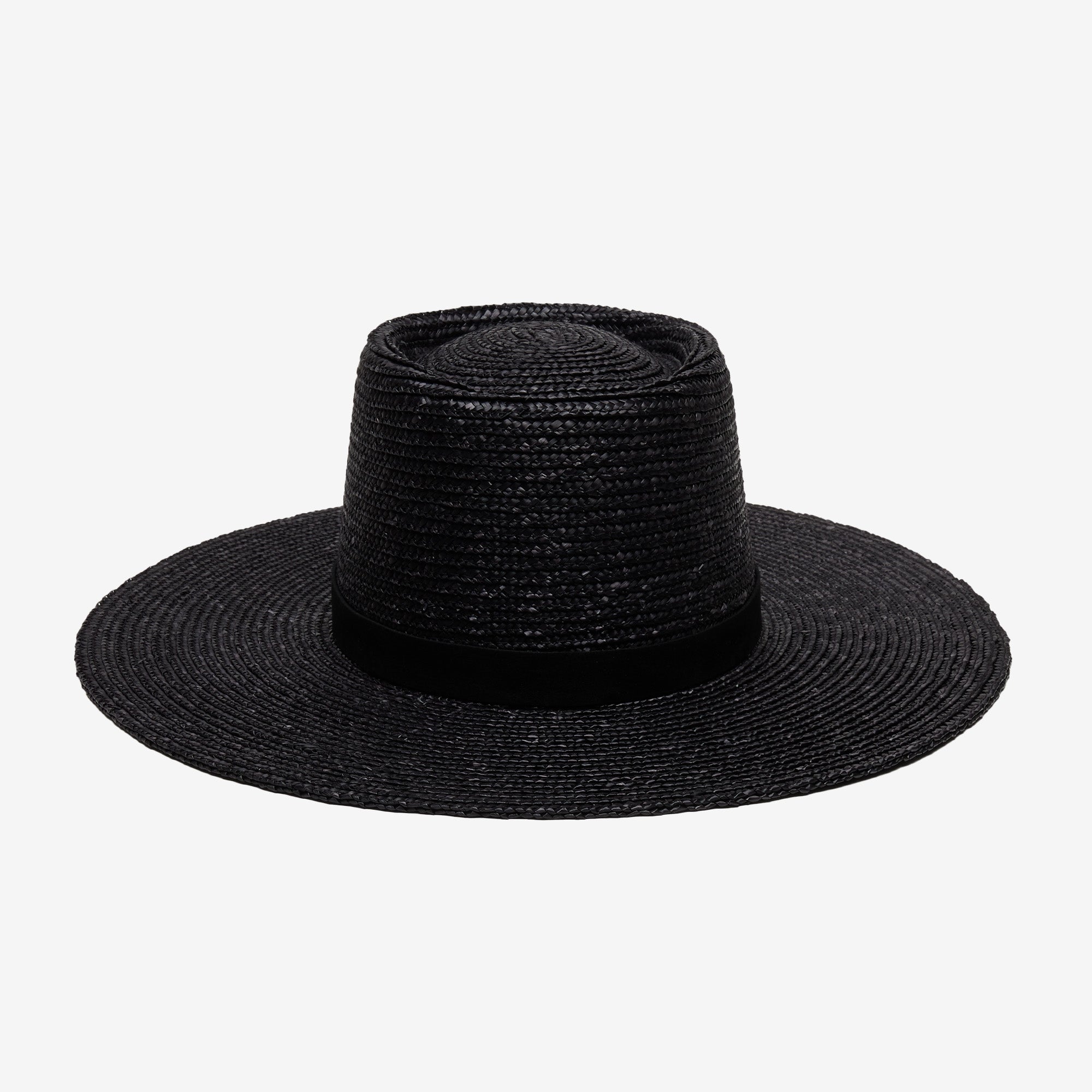 Black straw hat on a white background