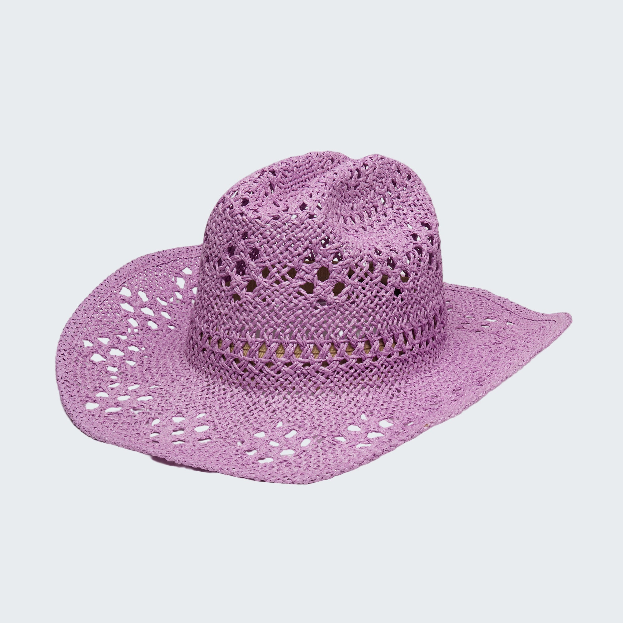 Purple straw hat on a white background