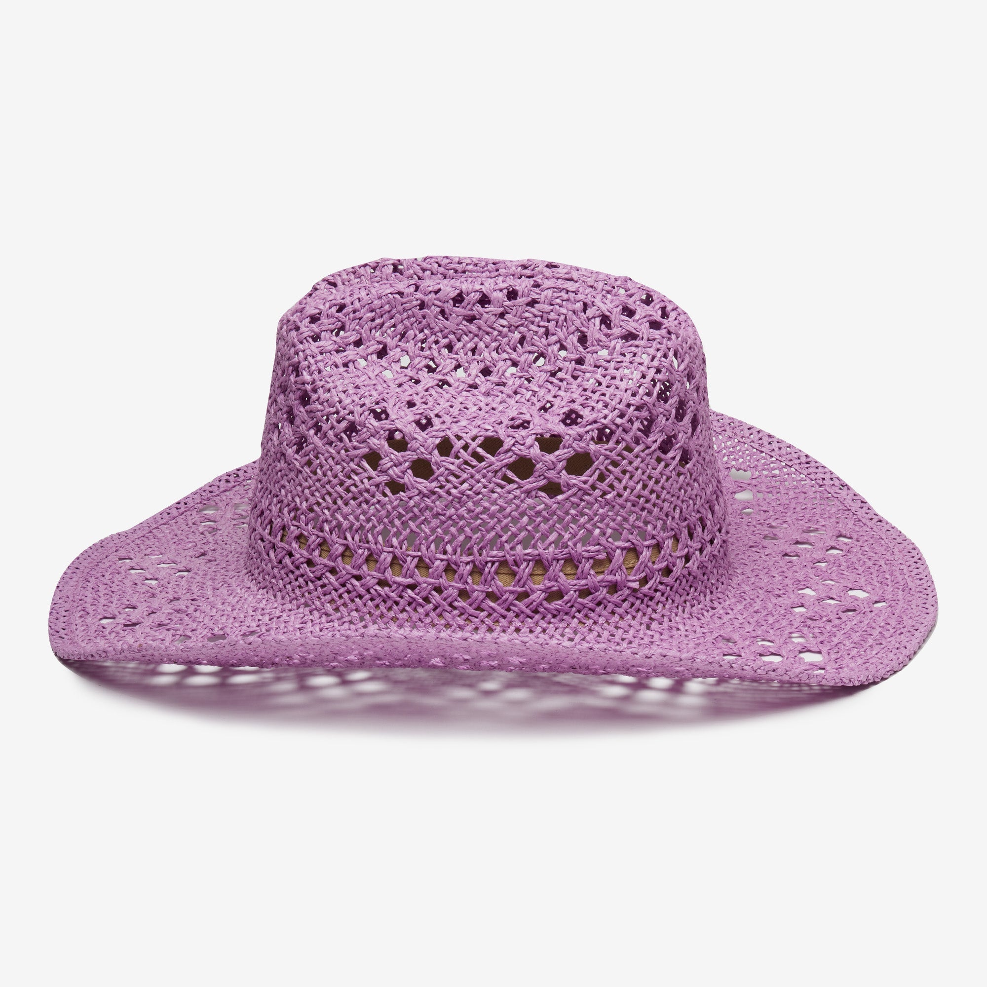 Purple straw hat on a white background