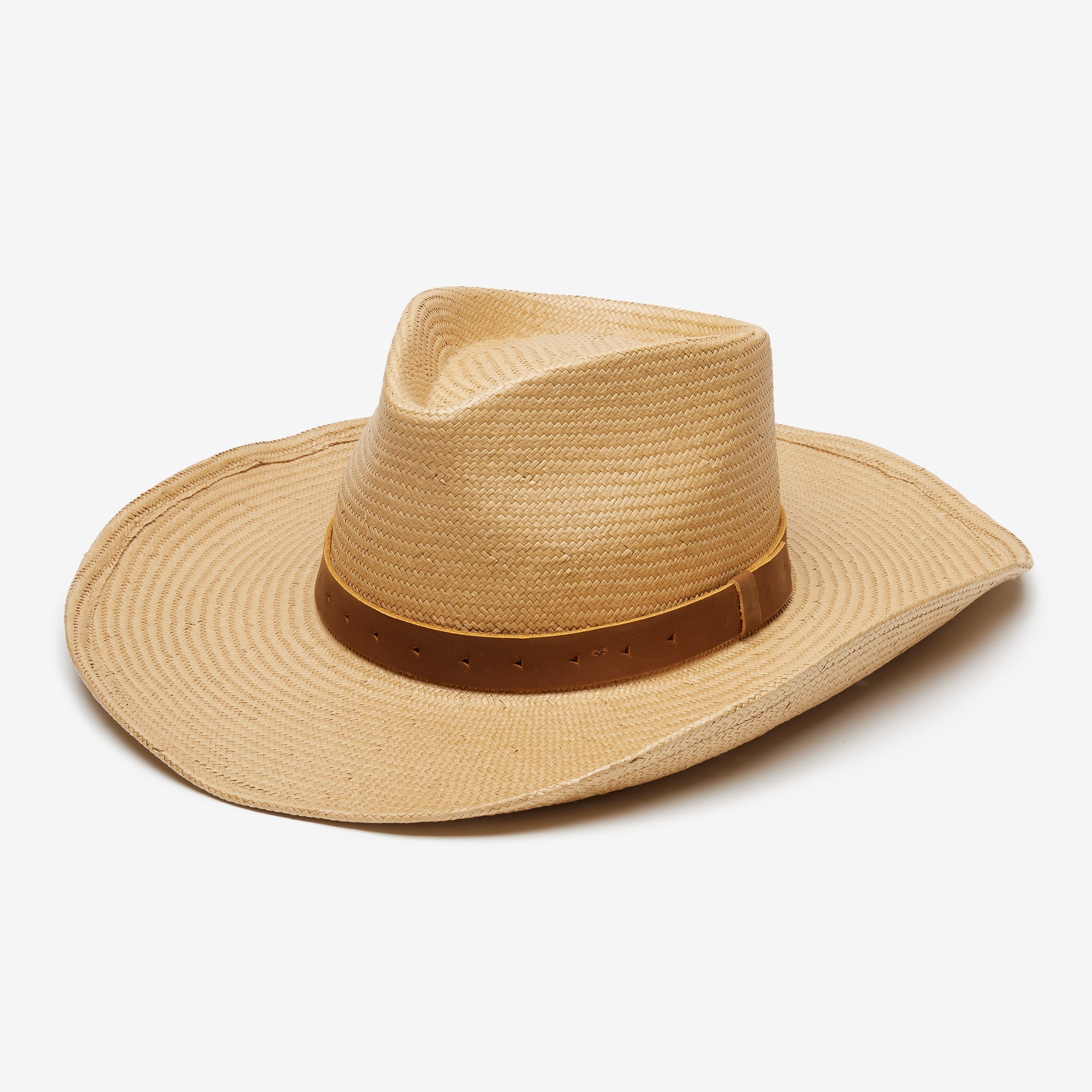 Beige straw hat with a brown band on a white background