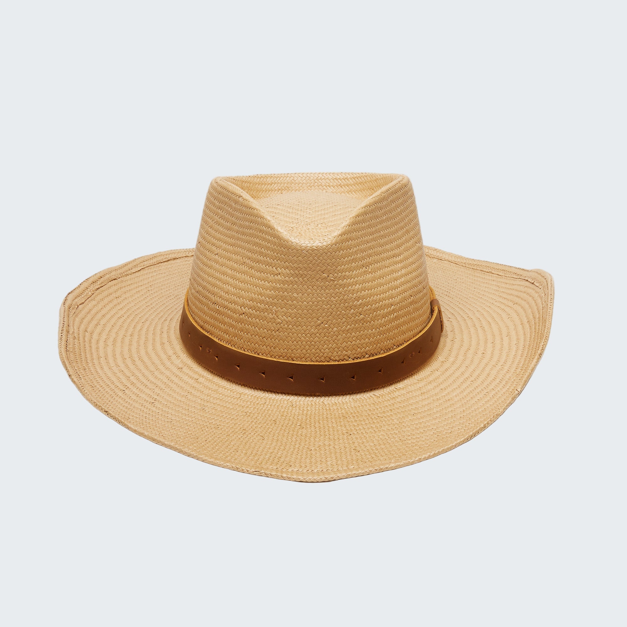 Beige straw hat with a brown band on a white background