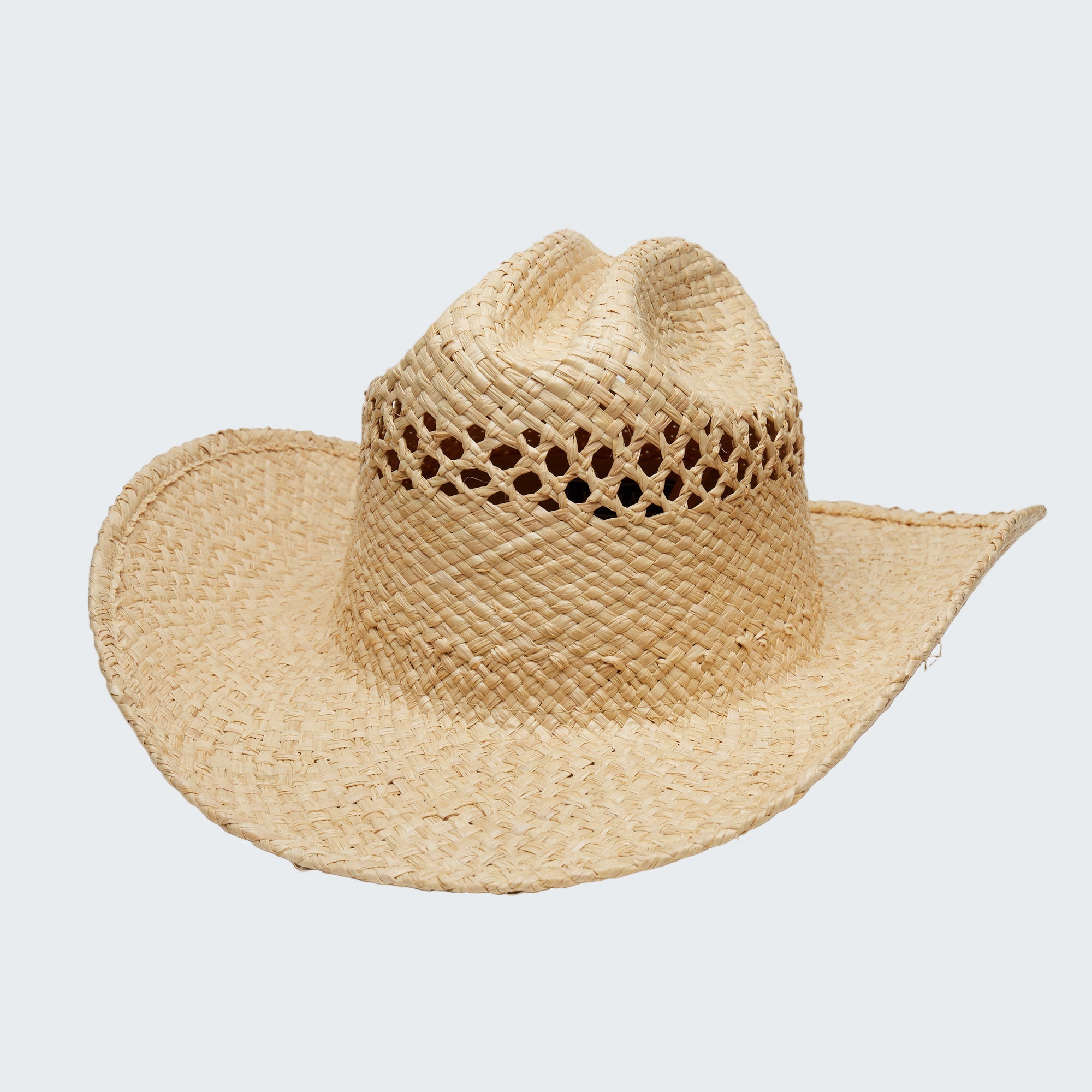 Beige straw cowboy hat on a white background