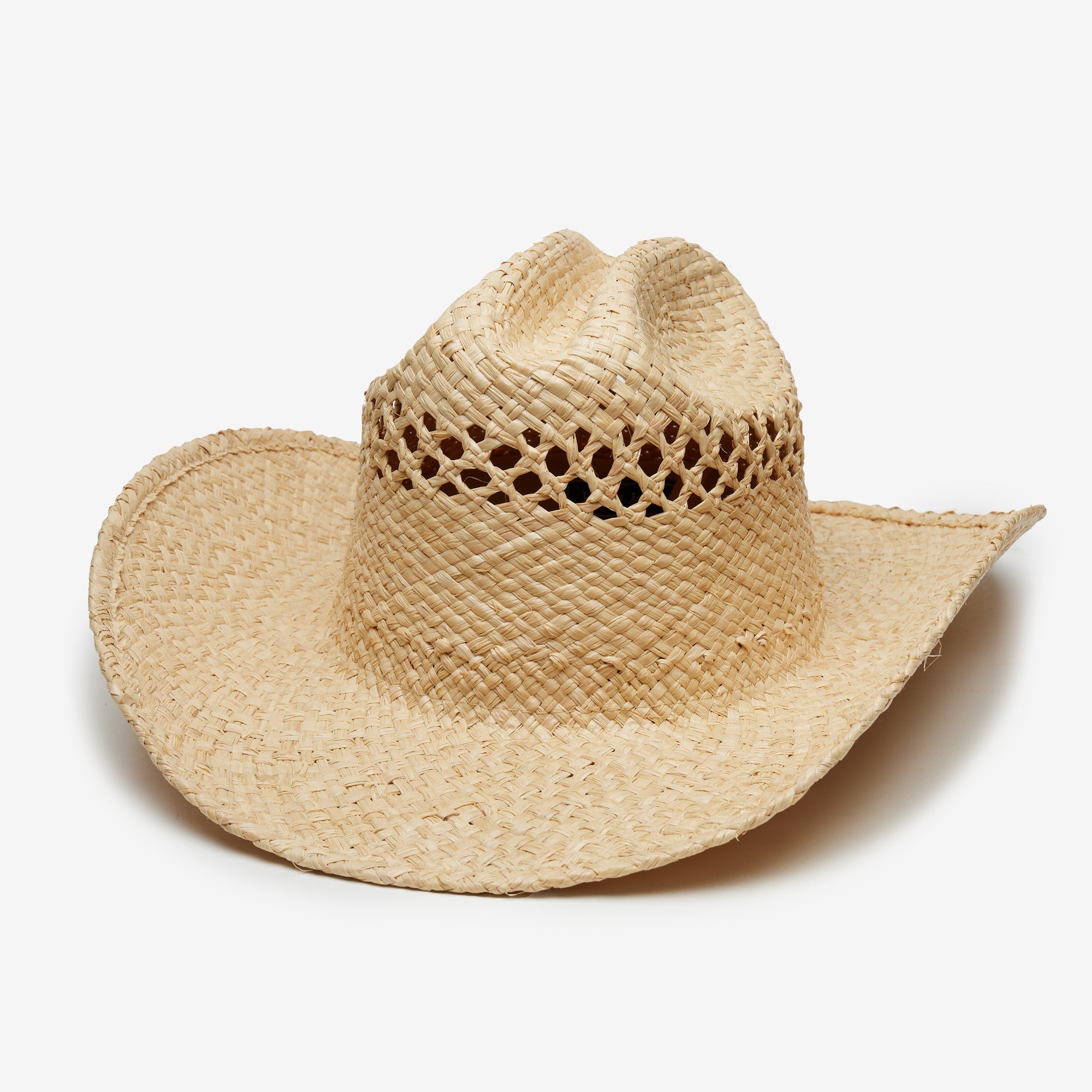 Beige straw cowboy hat on a white background
