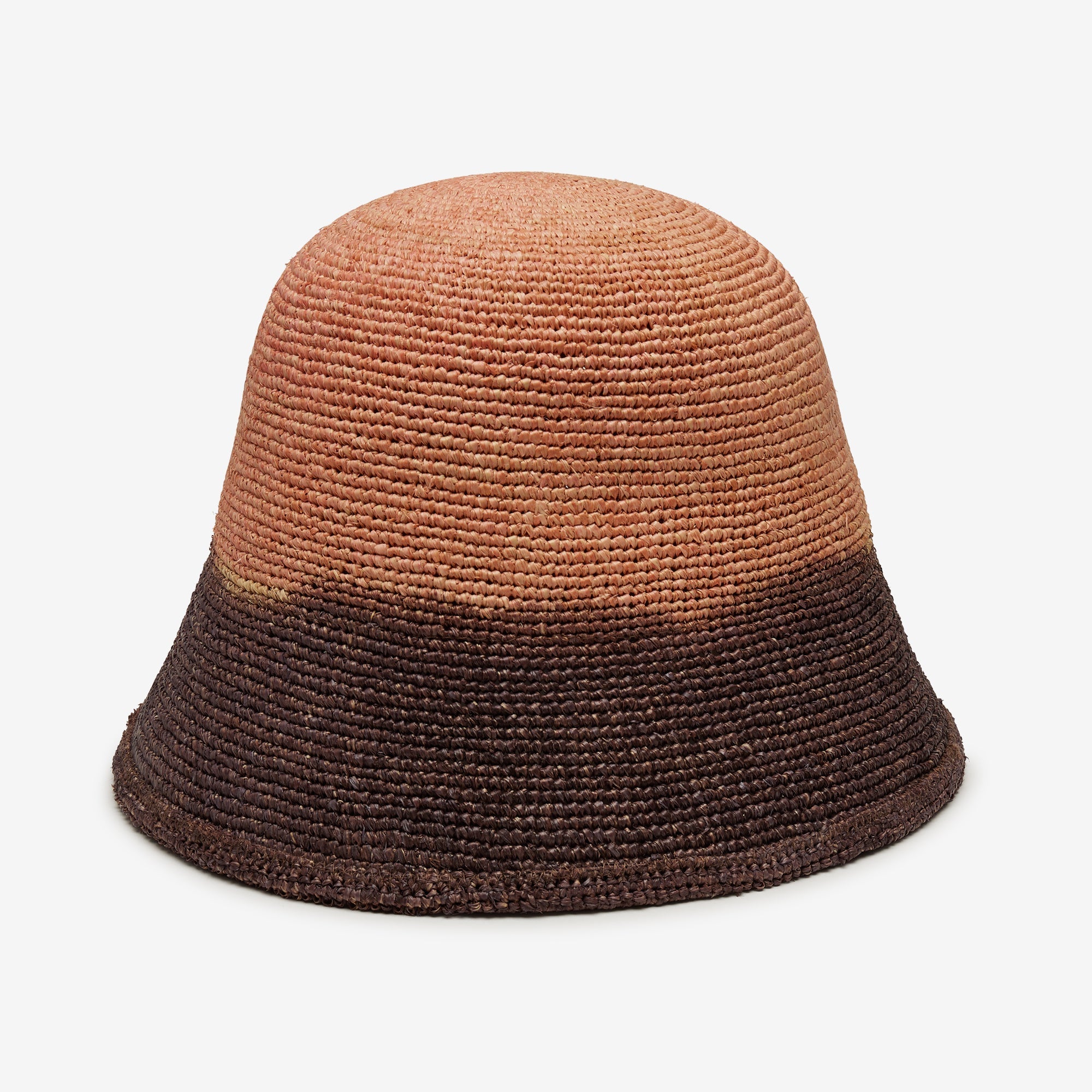 Two-tone brown bucket hat on a light gray background