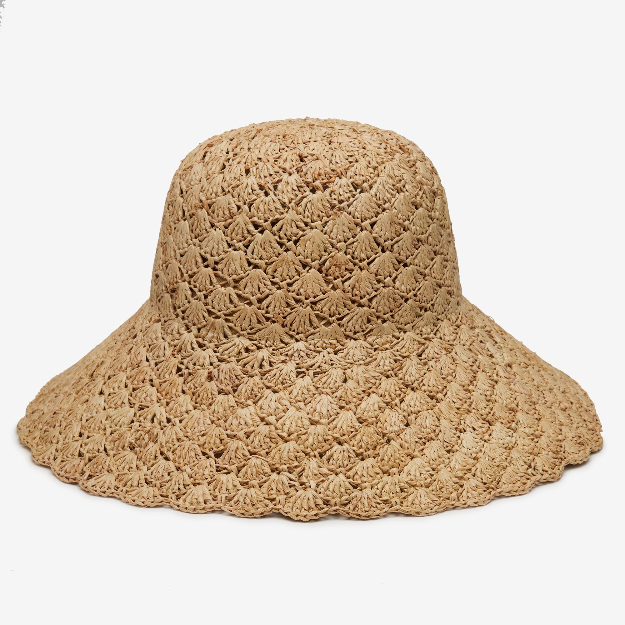 Beige crochet sun hat on a white background