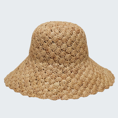 Beige crochet sun hat on a light gray background