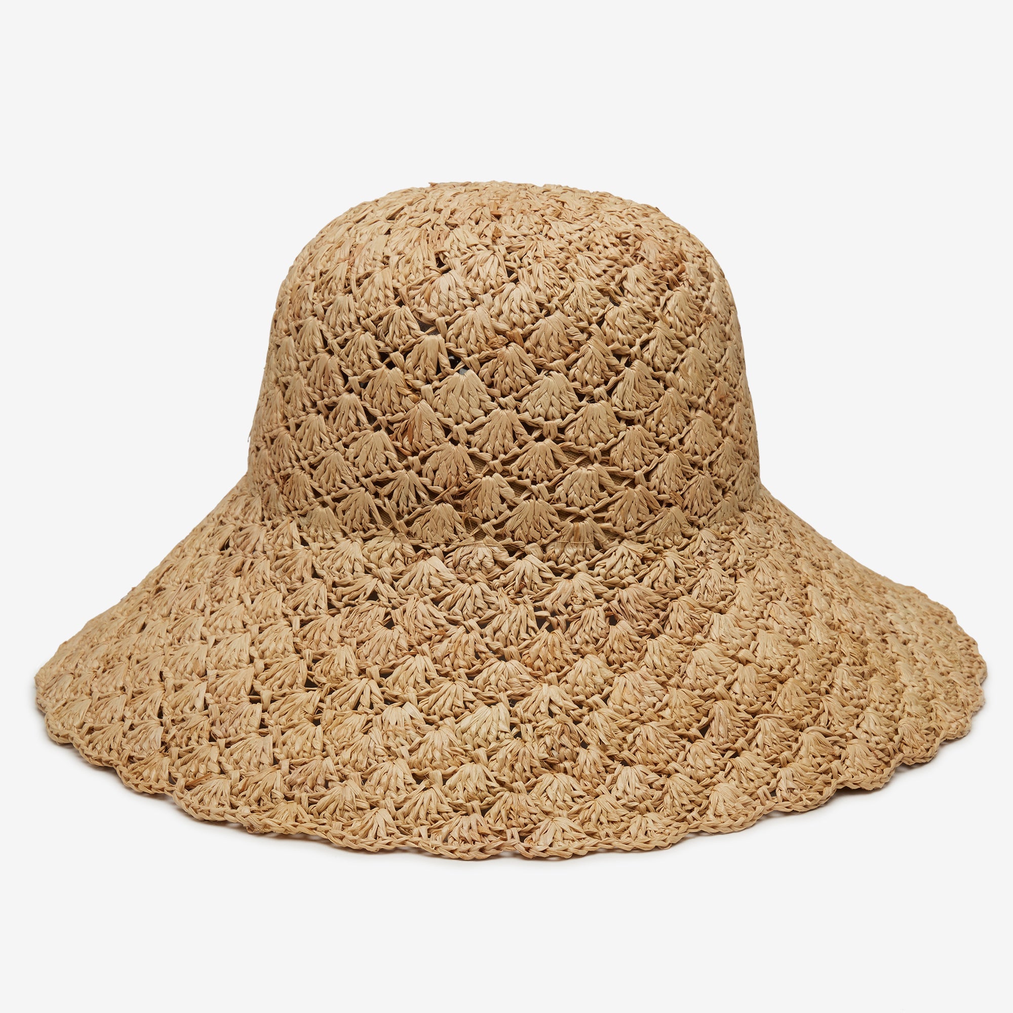 Beige crochet sun hat on a light gray background