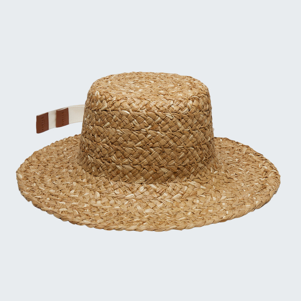 Woven straw hat with a band on a white background