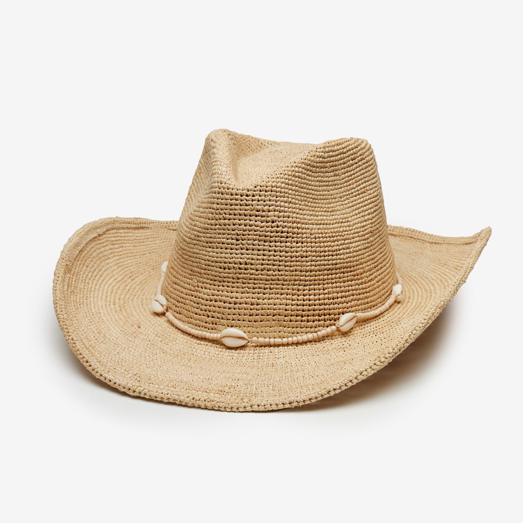 Beige straw hat with a band on a white background