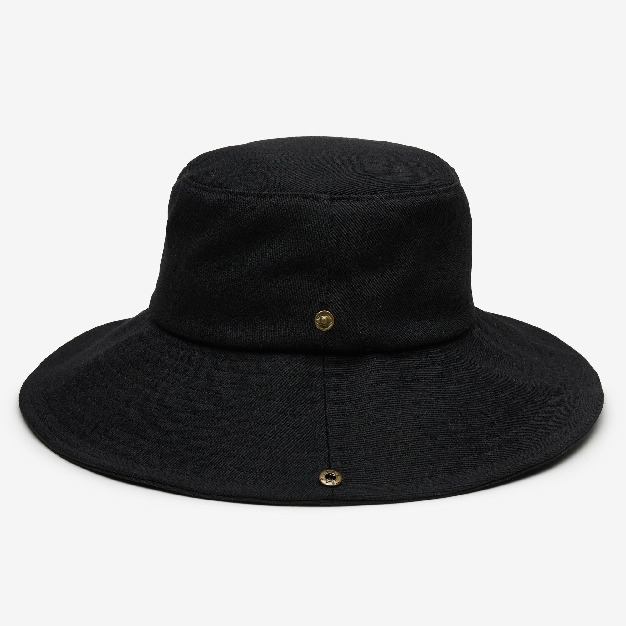 Black bucket hat with button details on a white background