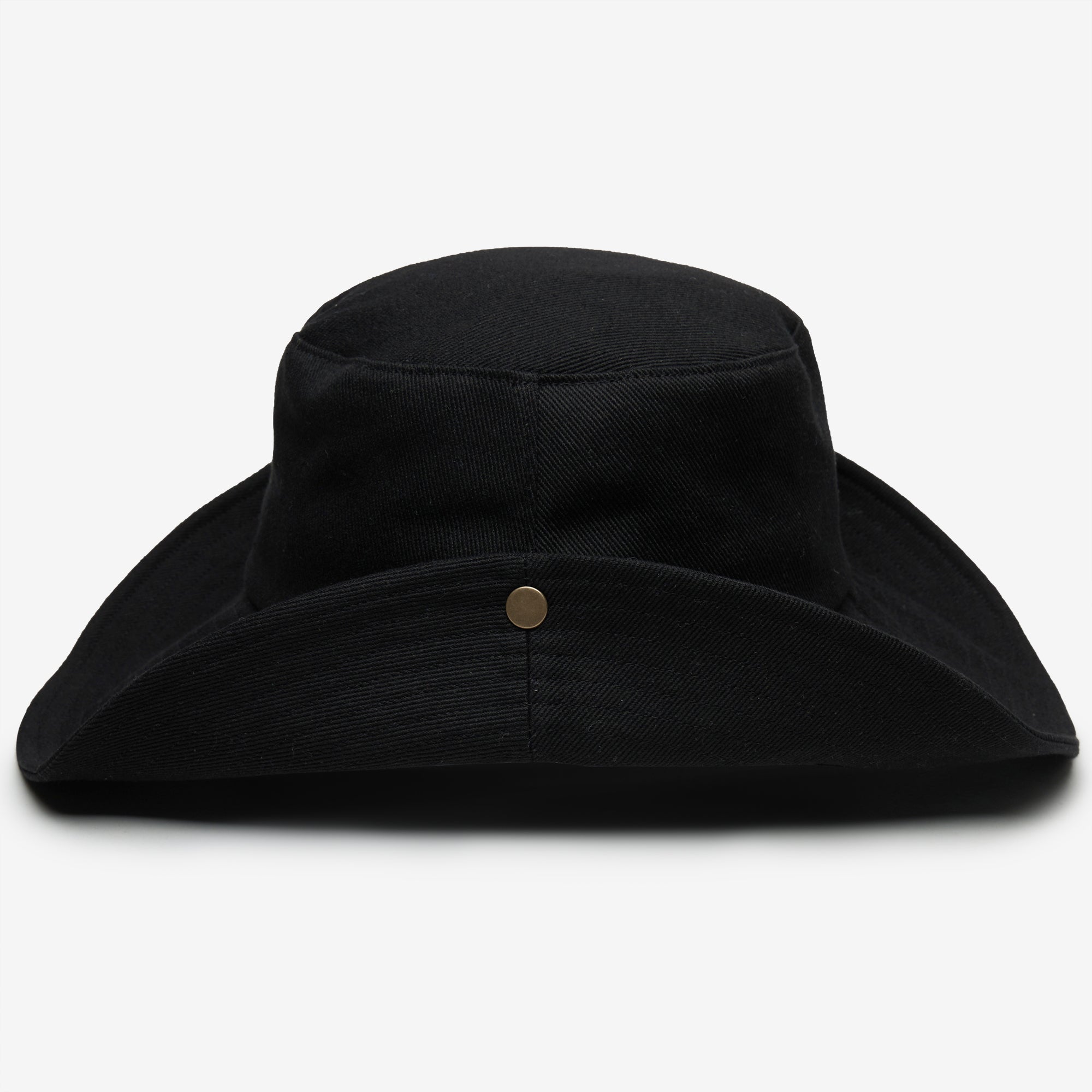 Black bucket hat with a button on a white background