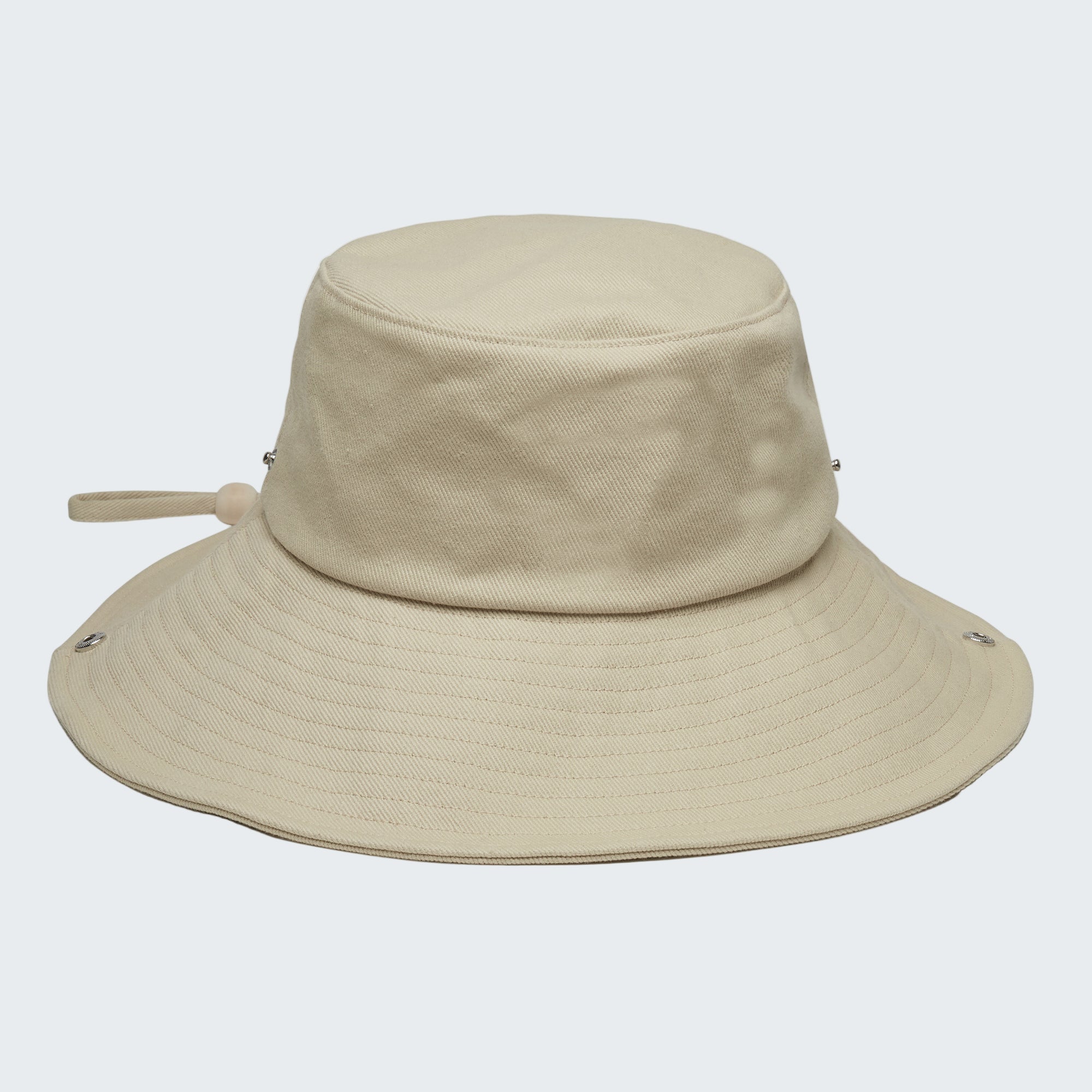 Beige bucket hat on a white background