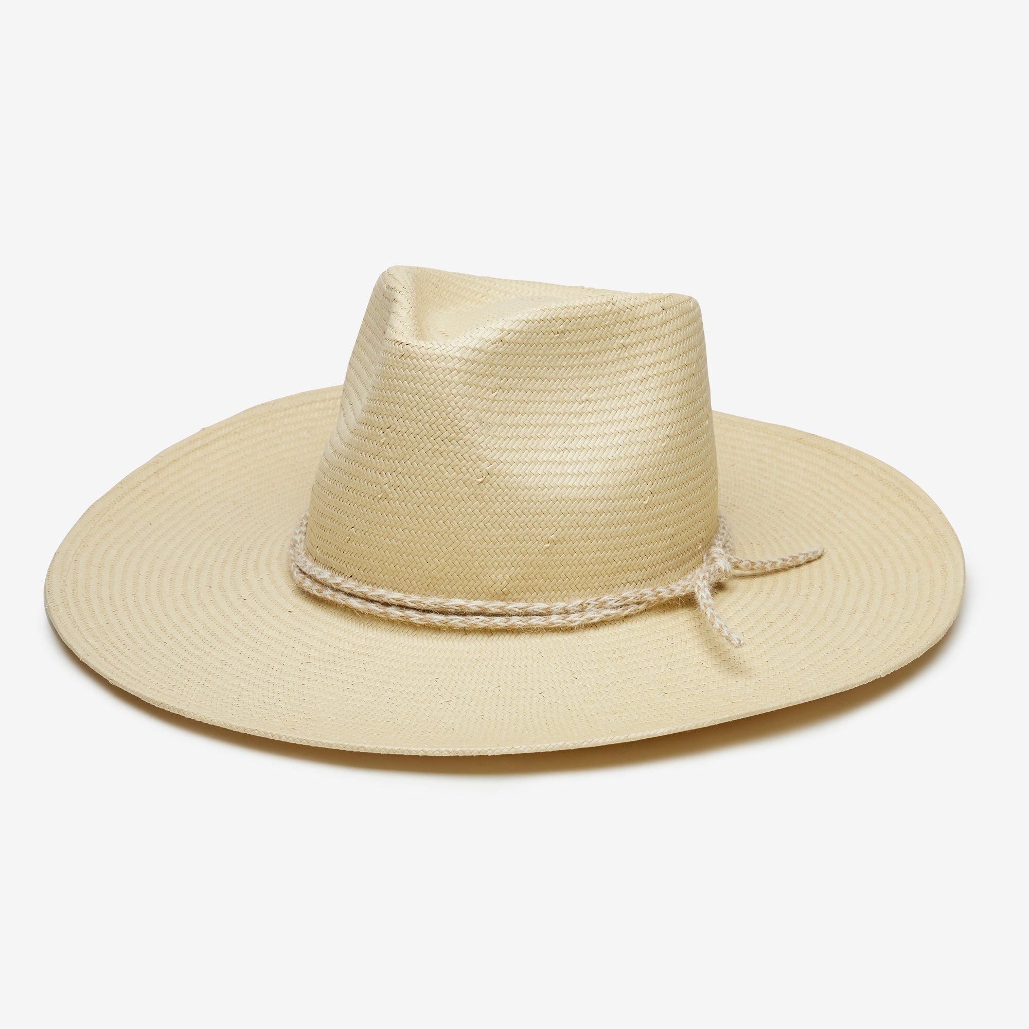 Beige straw hat with a wide brim on a white background