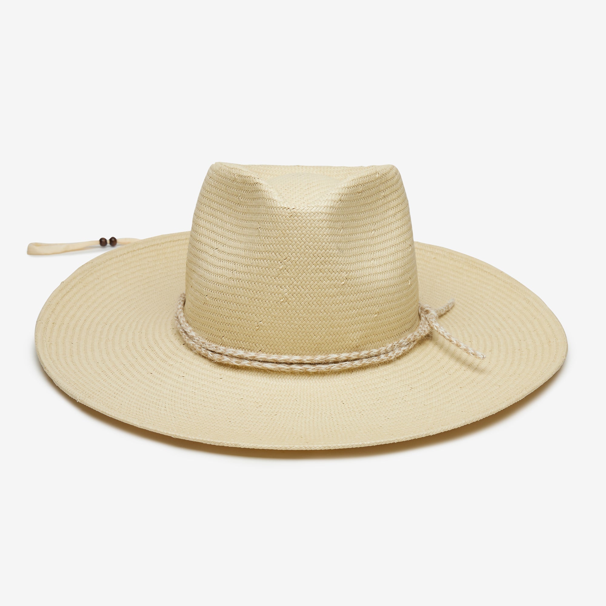 Beige straw hat with a wide brim on a white background