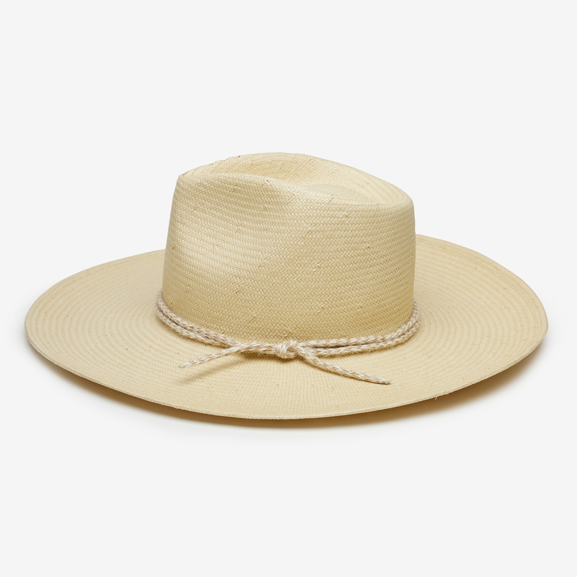 Beige straw hat with a wide brim on a white background